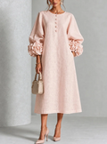 Elegante vestido midi rosa palo con rosetas 3D
