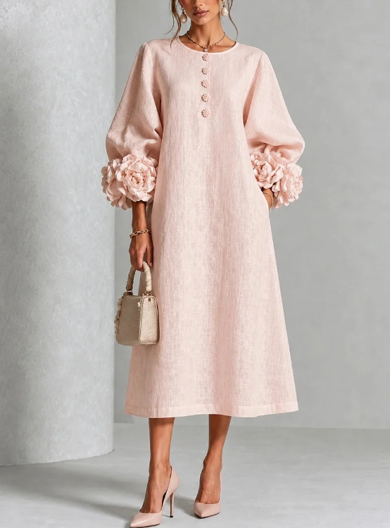Elegante vestido midi rosa palo con rosetas 3D